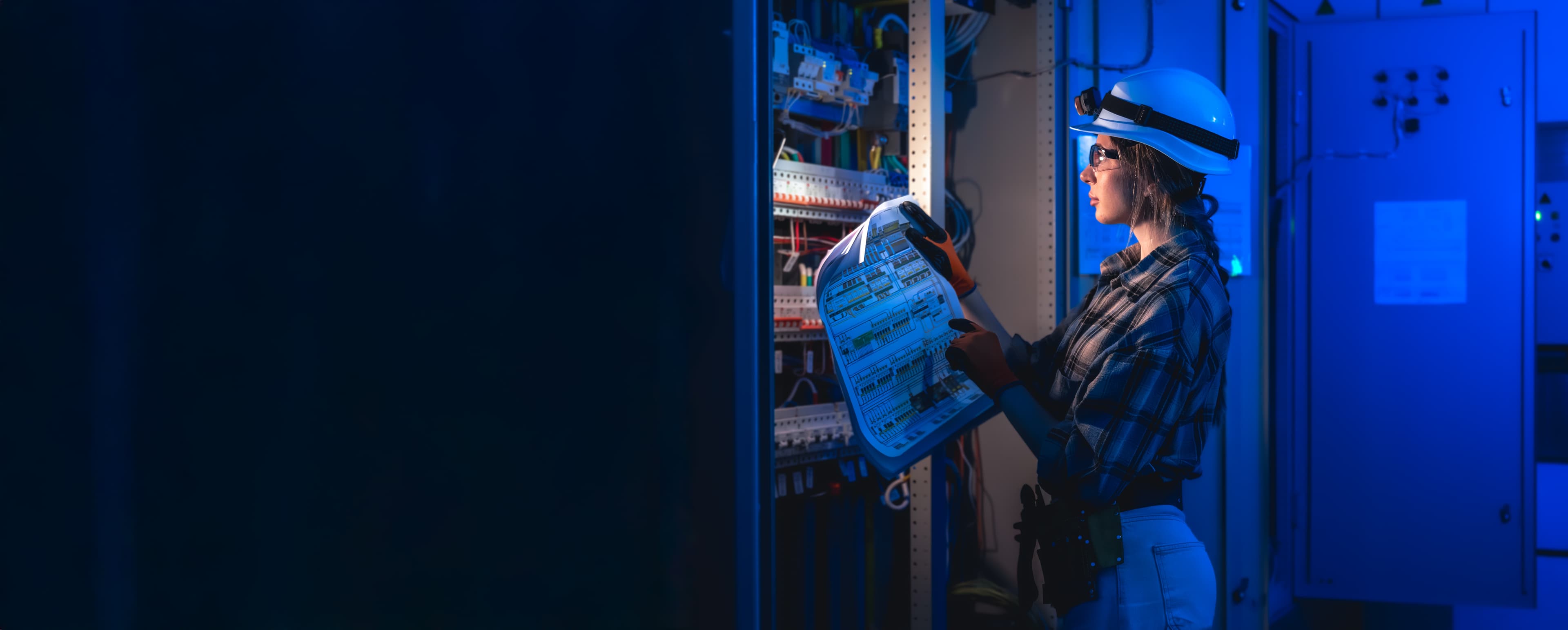 Engineer inspecting an on-premises server rack for a Dynamics 365 Finance & Operations installation